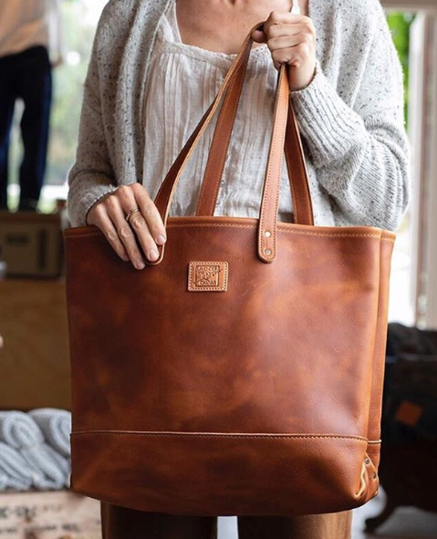 Leather carryall sales